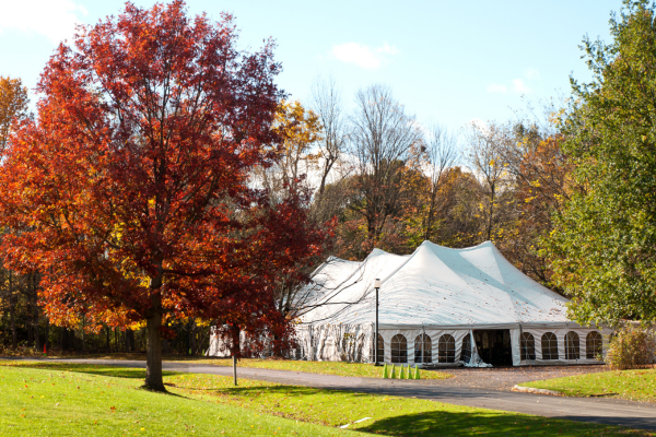 White party tent set up outside