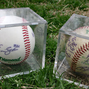 Signed baseballs in case